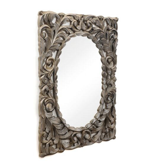 Hand carved decorative wall mirror by Cocovey